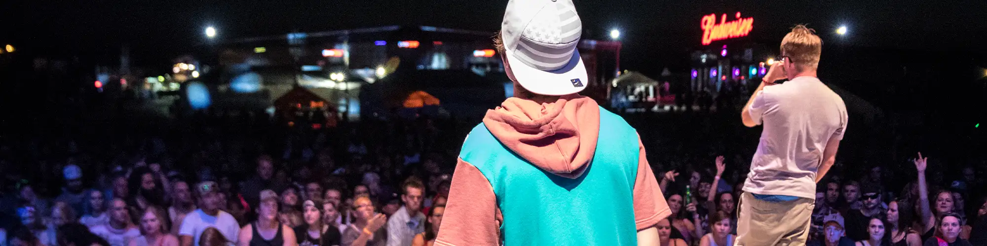 duo performing in front of crowd